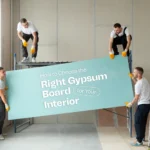 Workers installing drywall panel during interior setup – Best Gypsum Board Supplier in India