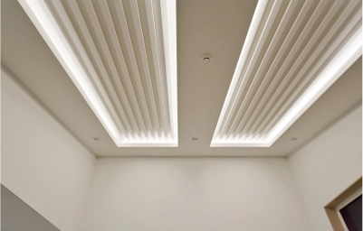 Stylish gypsum false ceiling design with recessed LED lighting by Buildwell