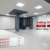 Buildwell Ceiling Tiles installed in a modern office interior — bright, flat, and rattle-free false ceiling panels that maintain a smooth finish and high durability even after years of use.