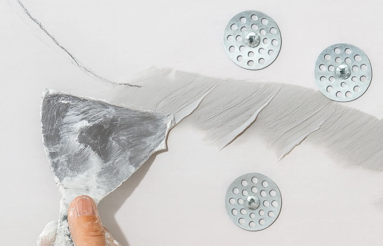 applying joint compound around Buildwell metal washers – Buildwell
