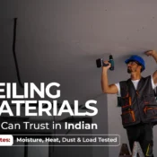 Worker installing ceiling materials with drill on construction site, showcasing durable and trusted ceiling products