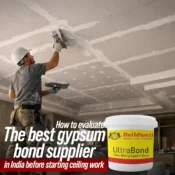 Worker applying gypsum plaster on ceiling using product from the best gypsum bond supplier in India for durable ceiling finish