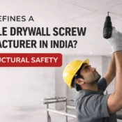 Technician installing ceiling panels using screws from a trusted drywall screw manufacturer in India for structural safety