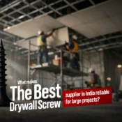 High-strength drywall screw in foreground with ceiling installation work in background representing the best drywall screw supplier in India