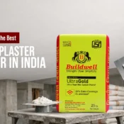 Construction site with premium gypsum plaster bag and finishing tool representing the best gypsum plaster supplier in India