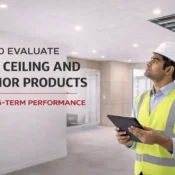 Engineer inspecting false ceiling and interior products in a commercial space for durability and long-term performance