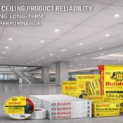 Commercial interior space with installed false ceiling tiles and display of gypsum boards, joint compound, drywall screws, and accessories from the Best Ceiling Products Brand in India