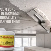 Gypsum bond being applied on a ceiling surface during plaster work to improve adhesion, strength, and long-term ceiling durability