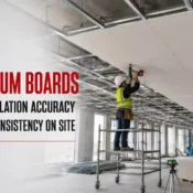Gypsum Boards being installed on a suspended ceiling framework to achieve accurate alignment, smooth finishing, and efficient interior construction.