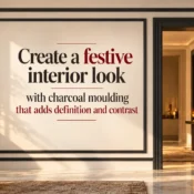 Elegant living room featuring Charcoal Molding on ivory wall panels and doorway frames, with warm festive lighting, modern furniture and sophisticated interior detailing.