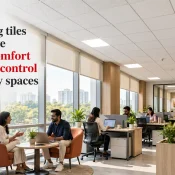 Ceiling Tiles installed across a modern office ceiling with integrated lighting above workstations and seating areas